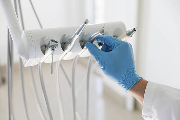 Professional Tooth Extraction technician working in Coal County County, OK